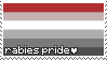 A stamp with the rabies pride pride flag with the words rabies pride with a heart emoji at the bottom left hand corner